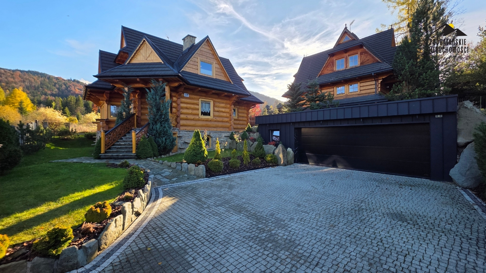 Drewniany dom w Kościelisku z widokiem na Giewont